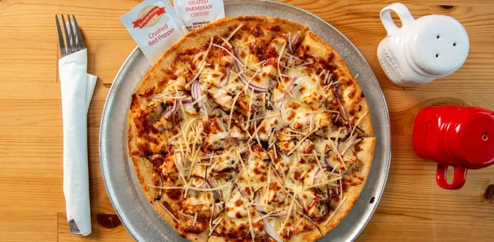 Fresh halal pizza in Seattle served at Castello Pizza & Pasta, a women-owned Italian restaurant offering halal dishes upon request.