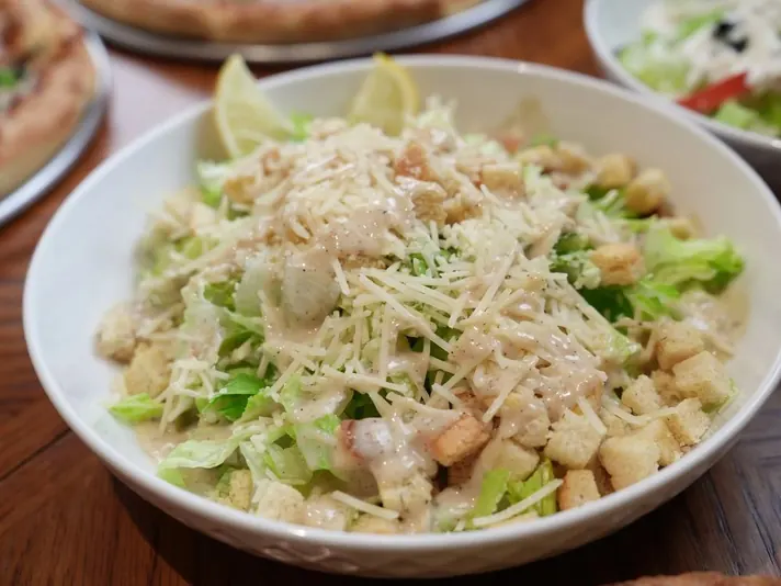 Caesar salad with croutons and parmesan